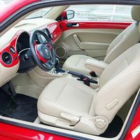 234 Volkswagen New Beetle красный